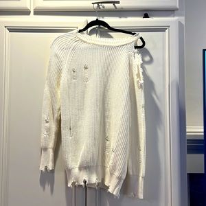 Off white distressed cold shoulder sweater